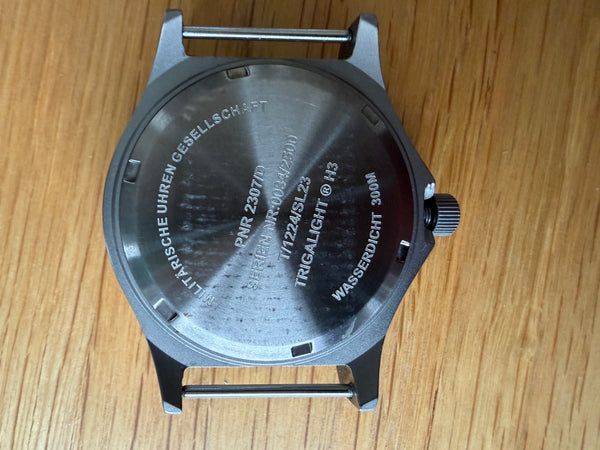 Titanium G10 Military Watch with 300m Water Resistance, Sapphire Crystal, 10 Year Battery Life and GTLS Tritium Illumination - Running but Needs 2 Hands Resetting