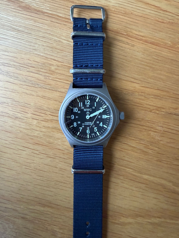 Titanium G10 Military Watch with 300m Water Resistance, Sapphire Crystal, 10 Year Battery Life and GTLS Tritium Illumination - Running but Needs 2 Hands Resetting