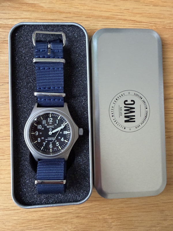 Titanium G10 Military Watch with 300m Water Resistance, Sapphire Crystal, 10 Year Battery Life and GTLS Tritium Illumination - Running but Needs 2 Hands Resetting