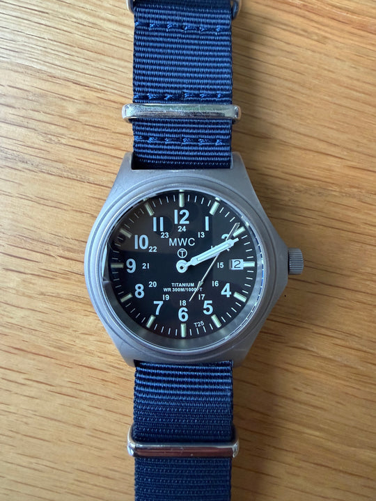 Titanium G10 Military Watch with 300m Water Resistance, Sapphire Crystal, 10 Year Battery Life and GTLS Tritium Illumination - Running but Needs 2 Hands Resetting