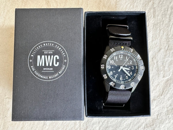 MWC P656 Tactical Series Watch with GTLS Tritium, 10 Year Battery Life Ronda 715li MovementMovement and Sapphire Crystal- Looks New